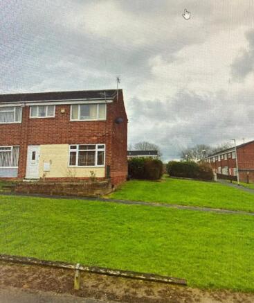 Front of house with surrounding area