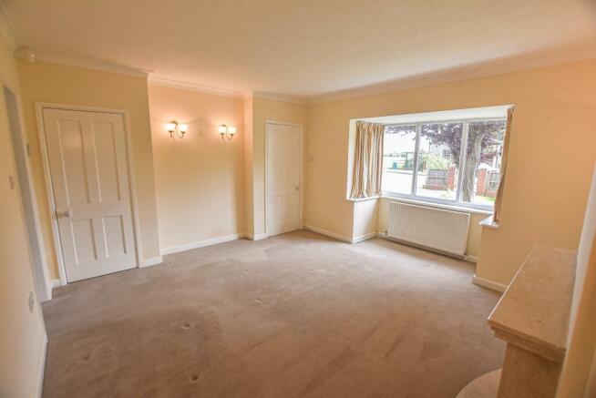 12 The Village - sitting room.jpg