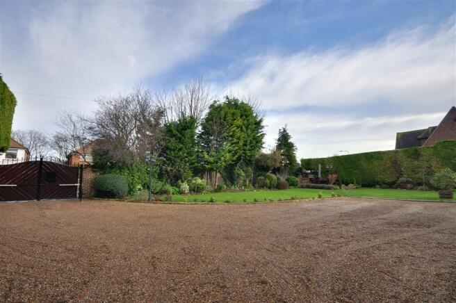 Gardens And Driveway
