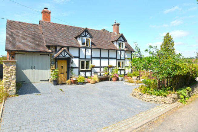 Character Grade II listed cottage