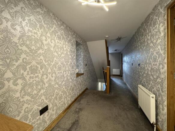 FIRST FLOOR LANDING