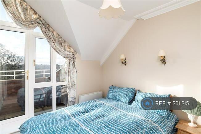 Bedroom With Balcony