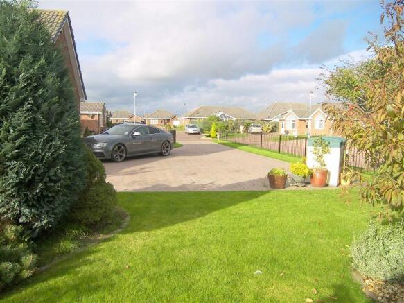 EXTENSIVE DRIVEWAY
