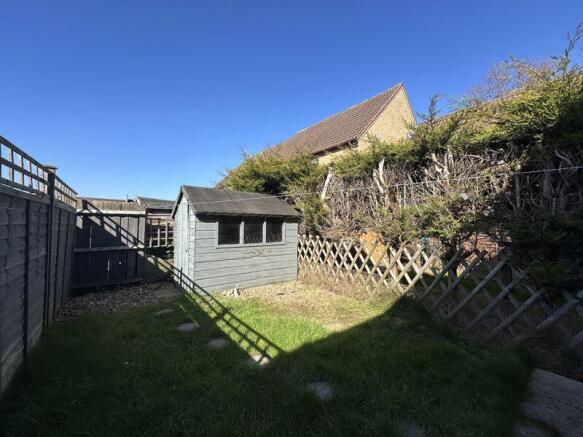 Rear Garden With Shed