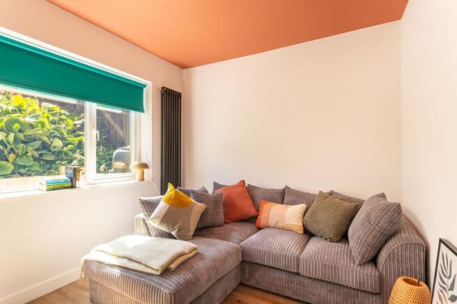 Cozy contemporary lounge with plush corner sofa...