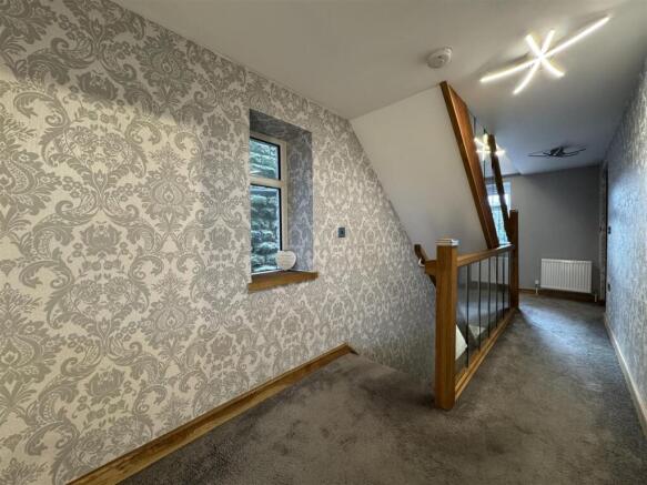 FIRST FLOOR LANDING