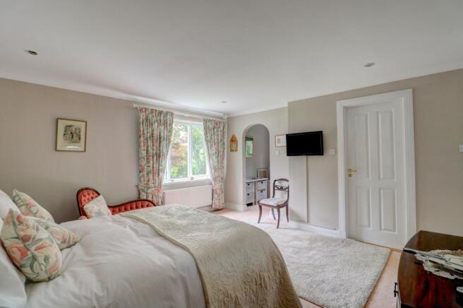 Master Bed Showing Dressing Room