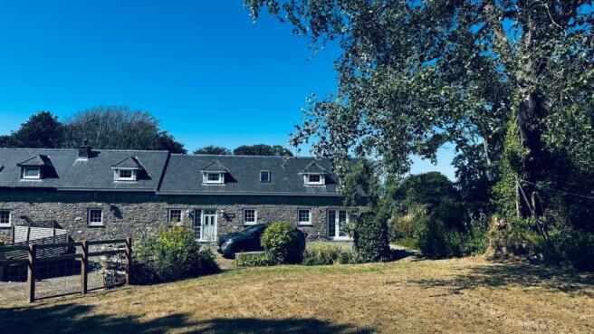 attractive garden and extensive parking