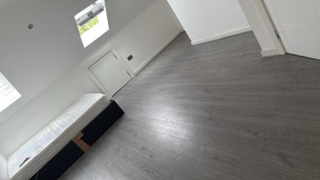 Spacious modern room with sleek wood-sleek wood...