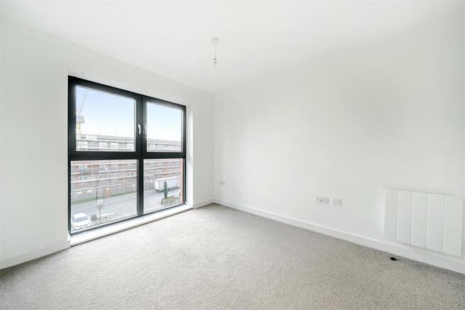 Bright and airy bedroom with modern finish...
