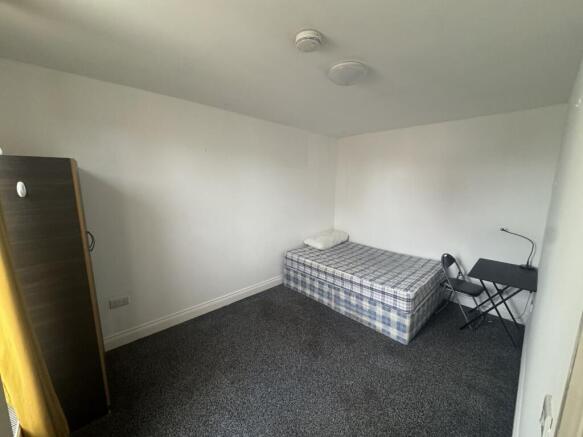 Bright and spacious bedroom with dedicated desk...