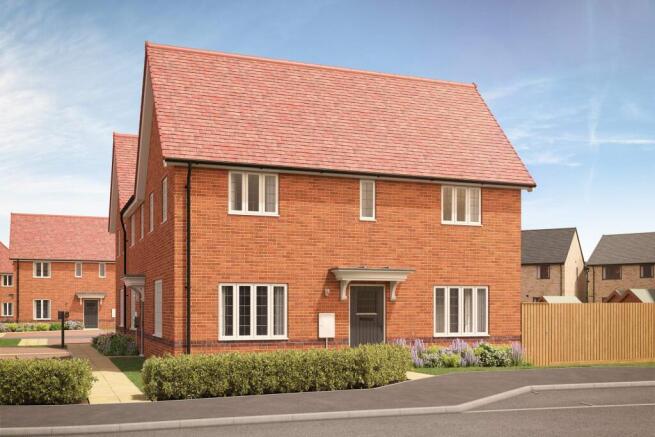 A modern brick house with a red tiled roof stands in the foreground