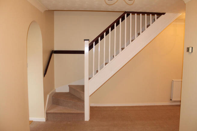Staircase Above Dining Area