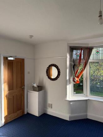 Bright bedroom with beautiful bay window view...