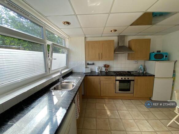 Large Kitchen With Storage Cupboard