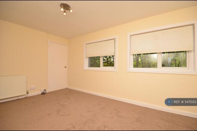 Master Bedroom With Large Cupboard And New Carpets