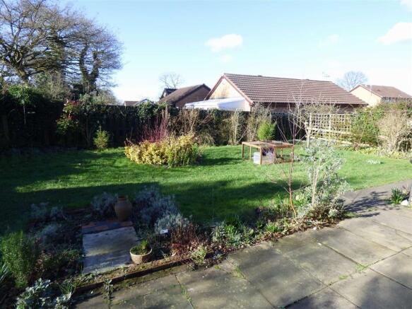 SIDE AND REAR GARDEN