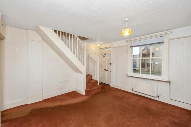LOUNGE OPEN TO STAIRS.jpeg