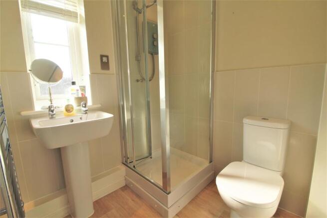 EN-SUITE SHOWER ROOM