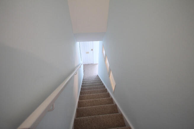 downstairs again