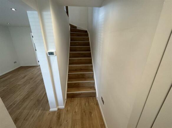 ENTRANCE HALL THROUGH TO LOUNGE