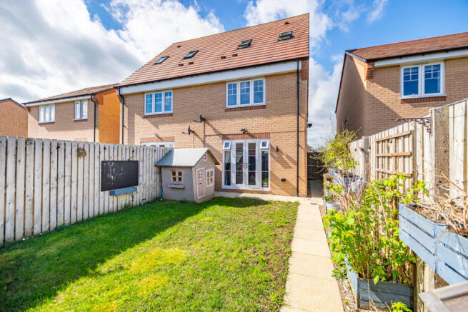 Rear elevation with lawn