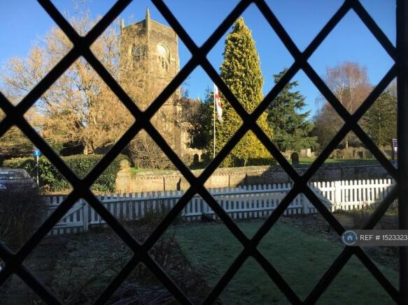 View To Front Of Church Through Leaded Windows