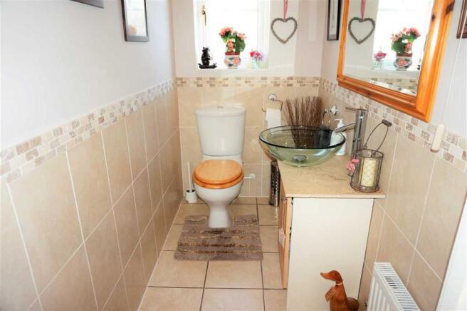 CLOAKROOM AND TOILET
