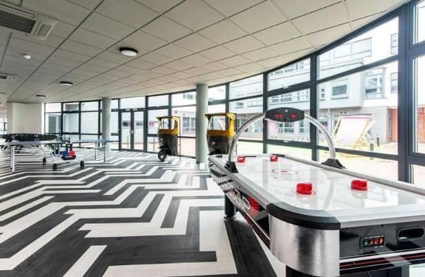 Bright and spacious communal lounge featuring m...