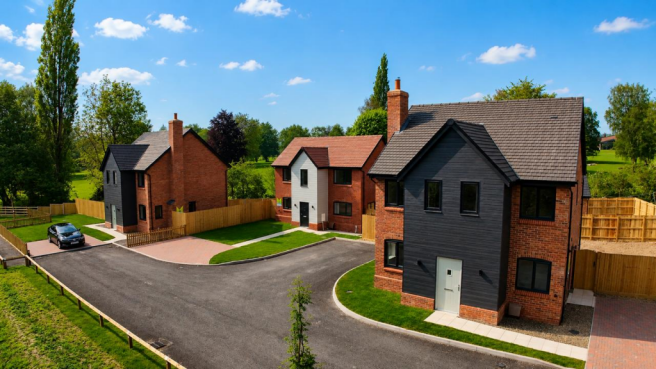 Close frontage of 3 x detached.png