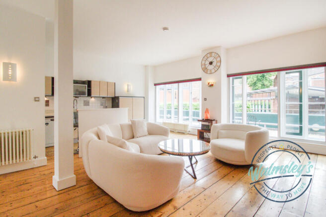 Sitting family room with doors to balcony