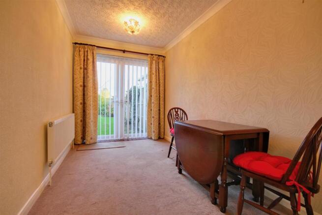 Dining room with french doors opening out in to th