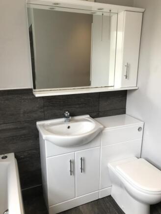 Main bathroom WC and Wash hand basin