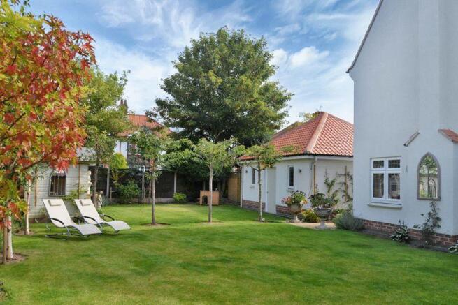 LANDSCAPED GAR...