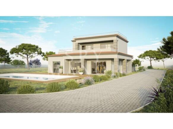 Luxury 2-storey detached villa in Vale del Rei, Carvoeiro, featuring a modern exterior, paved driveway, private swimming pool, and scenic Algarve landscape surrounding the property.