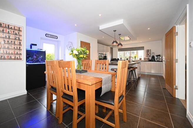 Living kitchen with bifolding doors into gardens