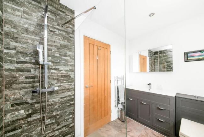 BEDROOM ONE EN-SUITE SHOWER ROOM