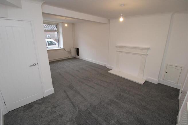 Bright, spacious living room with fresh carpets...