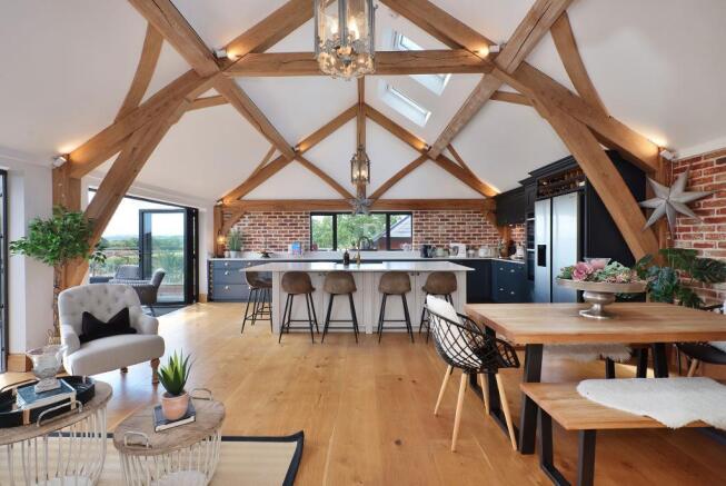 Kitchen/Dining room with vaulted ceiling