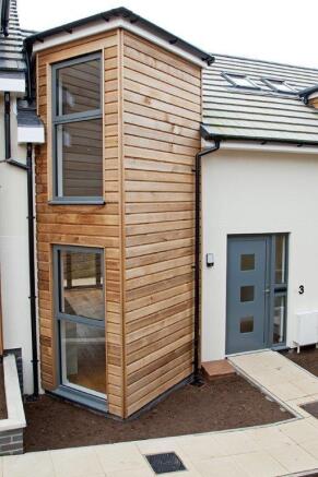 Modern exterior with stylish timber cladding...