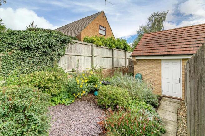 Garden to rear of garage (1).jpg