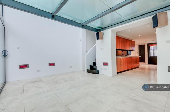 Conservatory Living Space Leading To Garden