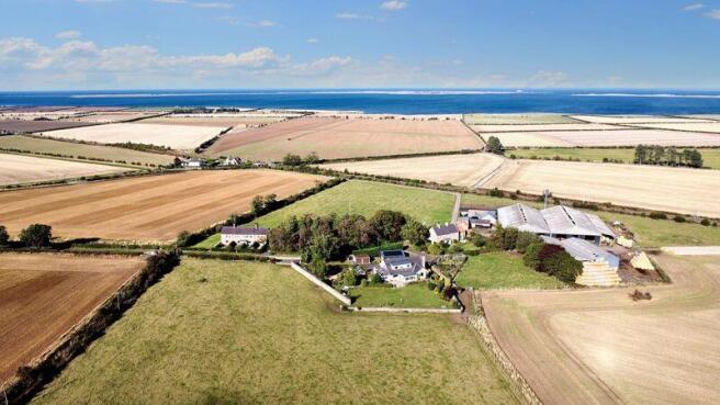 Plot with distant views of Lindisfarn...