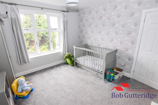 BEDROOM THREE (REAR)