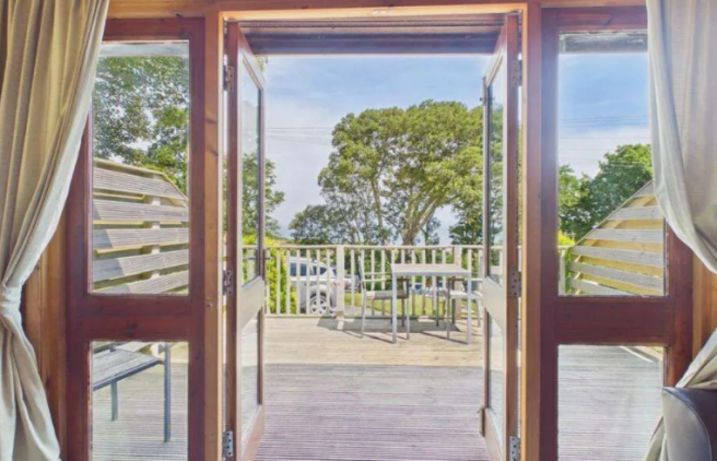 French Doors Opening From The Lodge Onto The Sunny