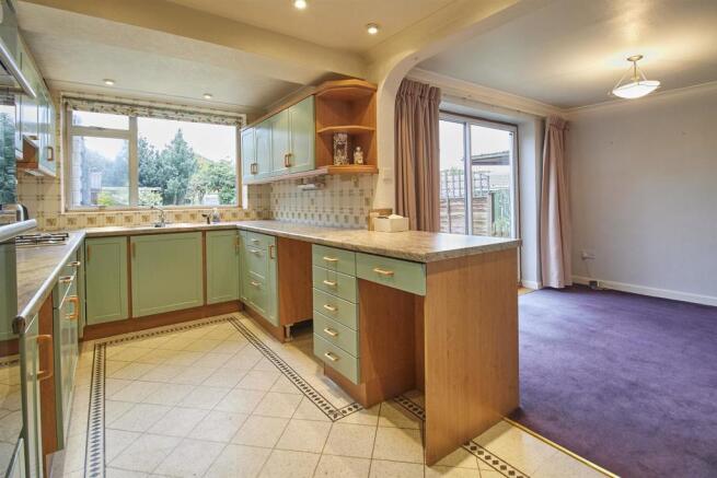 Extended L shaped open plan dining kitchen