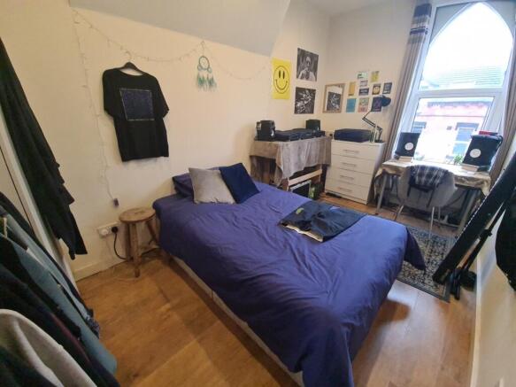 Bright and inviting master bedroom featuring a ...