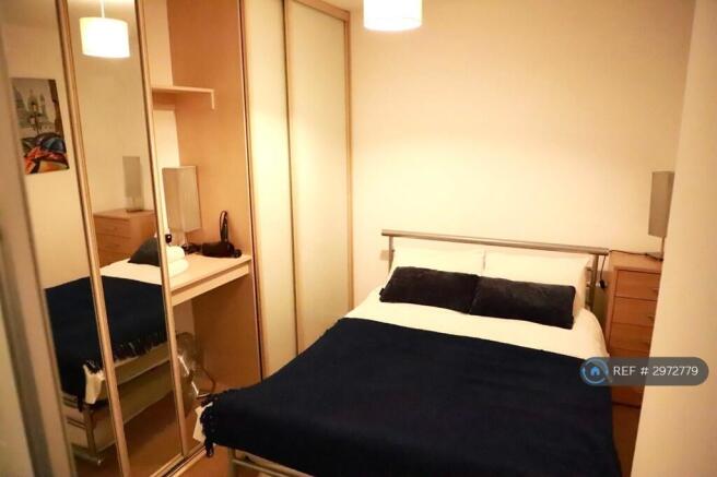 Bedroom - Double Bed With Built In Wardrobe.