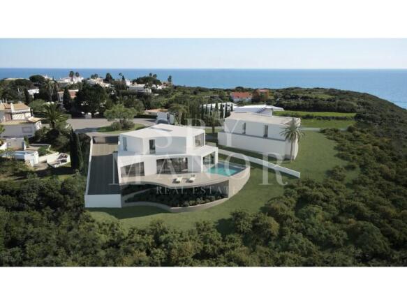 Aerial view rendering of a modern white luxury villa with an infinity pool and ocean views for sale in Vale de Lapa, Carvoeiro, Algarve