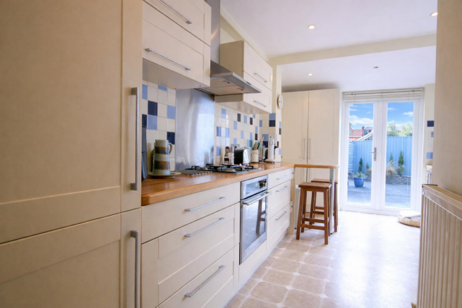 Modern kitchen with courtyard view.png